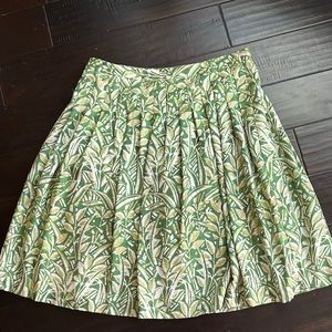 Silk skirt. Primary color is green.
